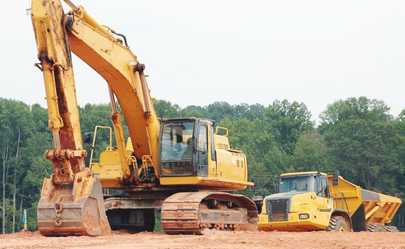 Increase ROI Through Construction Equipment Leasing - equipment and site.jpg